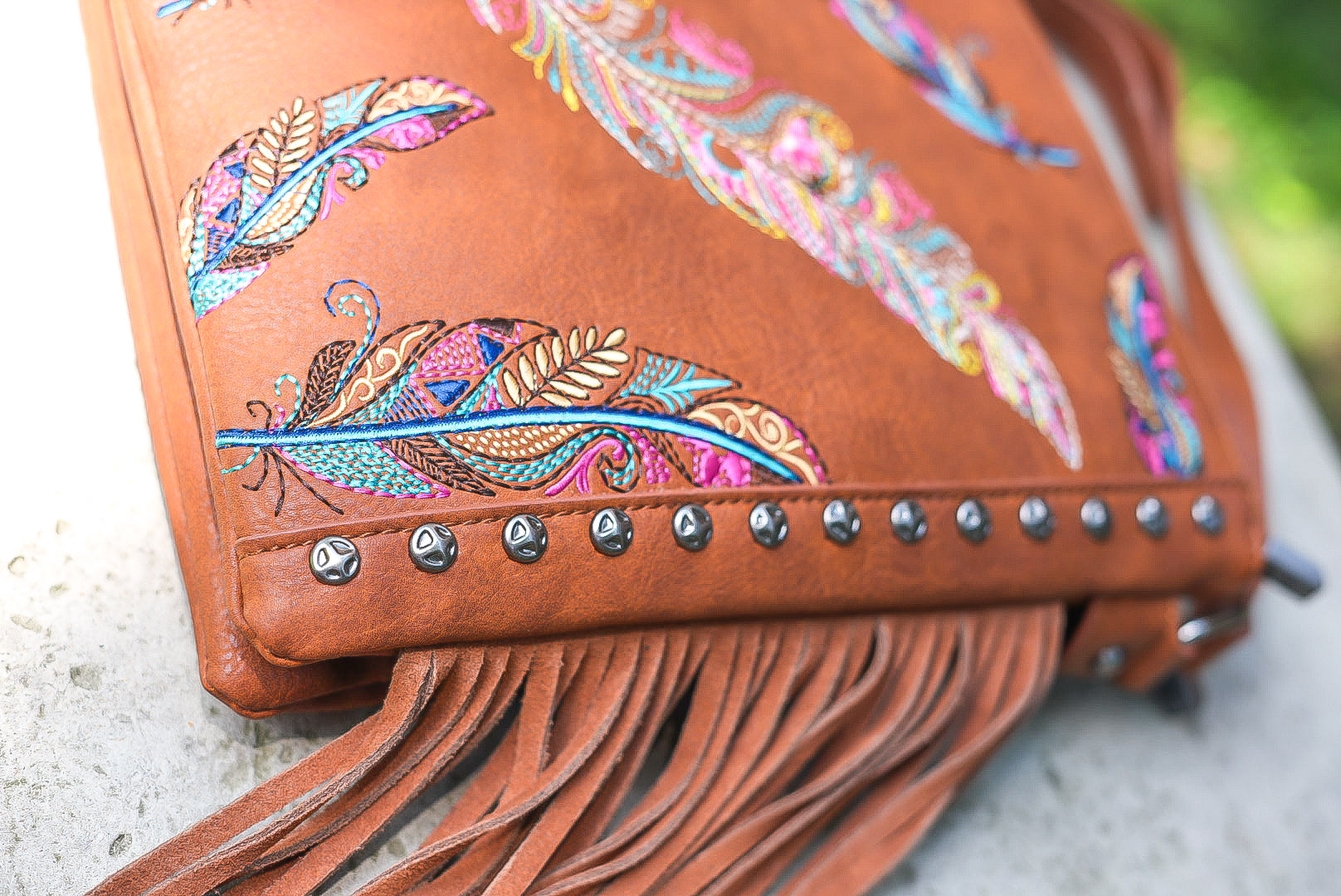 Tan boho feather purse Montana west