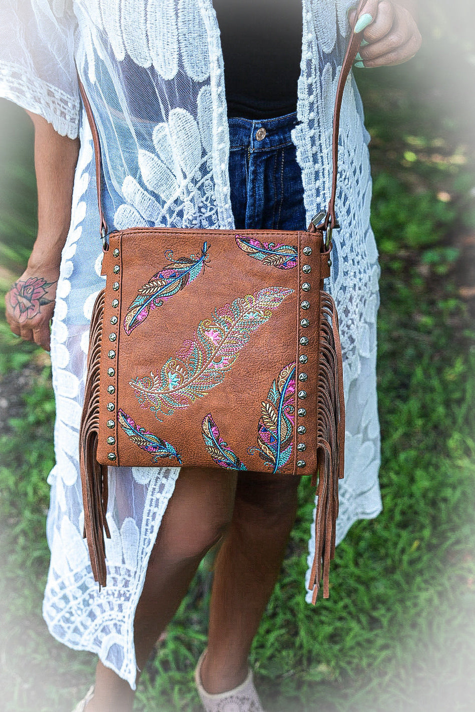 Tan boho feather purse