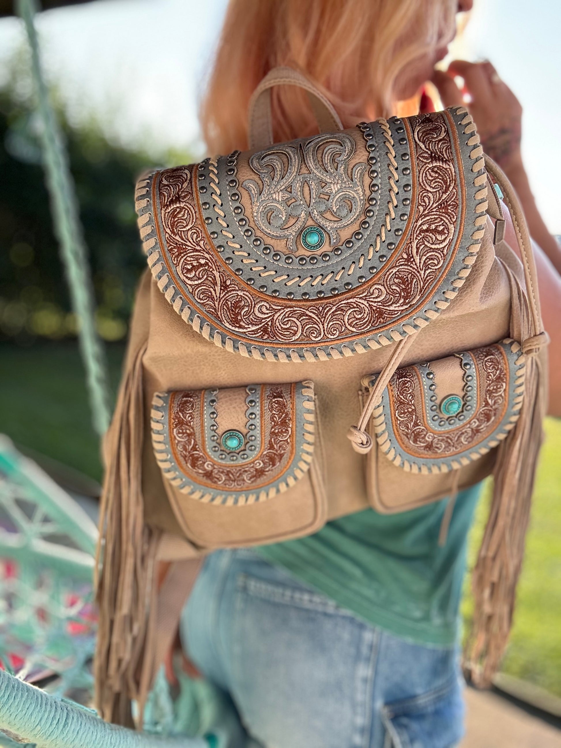 Celebrity Daytrip Studded Vegan Leather Embroidered Fringe Backpack in – AlyandJoshua